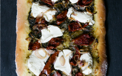 Beet Greens Pesto Pizza with Caramelized Shallots, Goat Cheese & Roasted Tomato